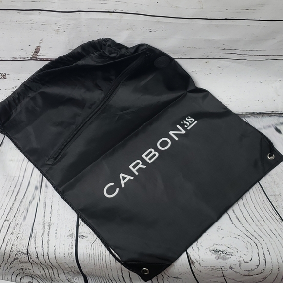 Carbon38 Handbags - Pull String lightweight backpack with zip pocket